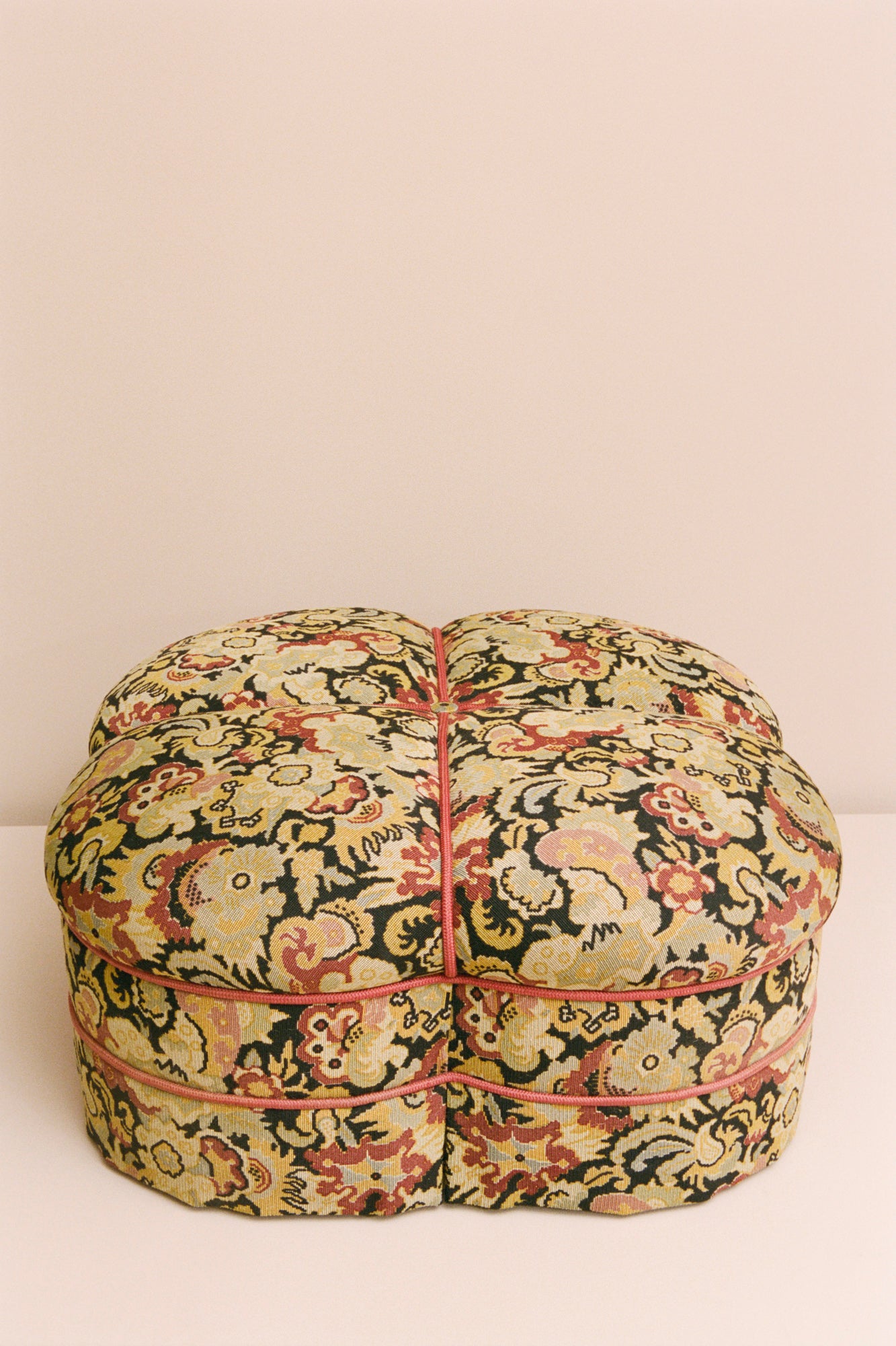 Quatrefoil Upholstered Ottoman